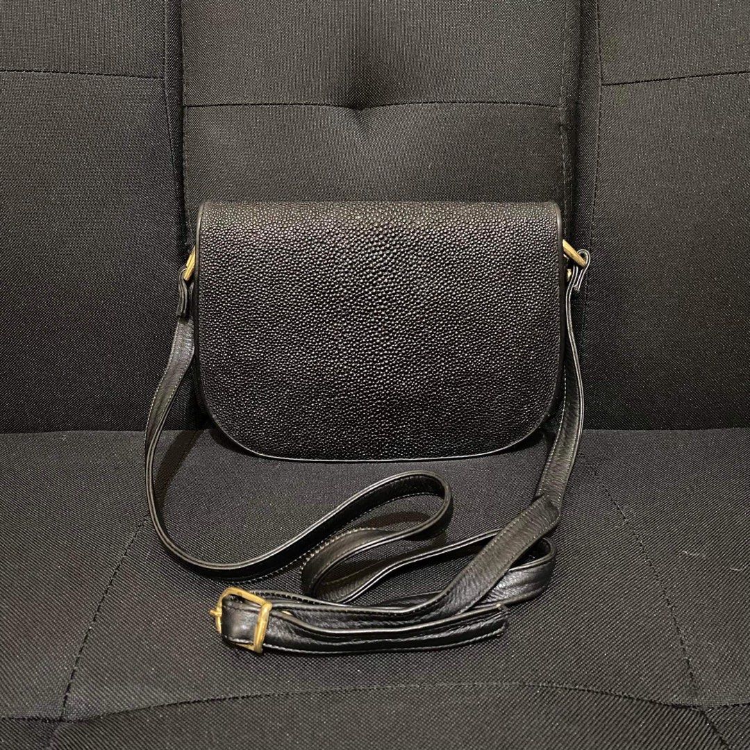 Stingray Leather Sling Bag (Category: Sling Bags) located in Pasig City. Submitted by danielle_mikael (Listing ID 1244868061, Image 2). Description: Stingray Leather Sling Bag Unbranded Good condition Plus shipping fee.