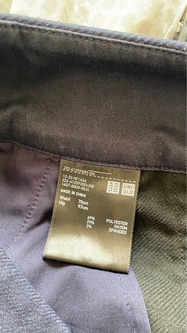 Uniqlo navy blue skirt (Category: Skirts) located in Bacoor. Submitted by mcyzon (Listing ID 1244929207, Image 2). Description: Uniqlo wrap dress.