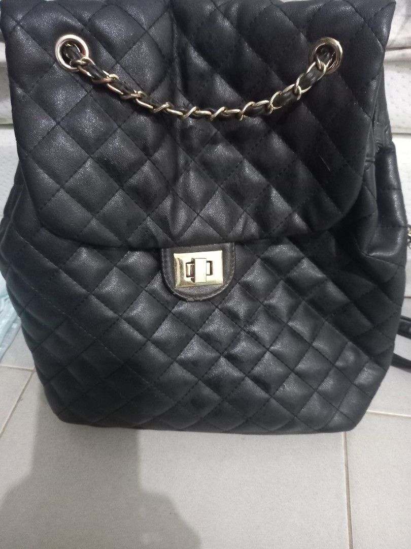 Quilted on sale chain backpack