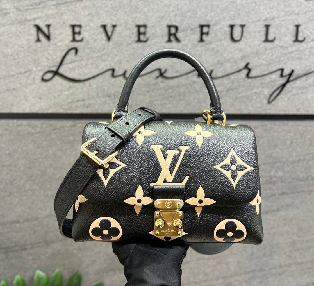 Louis Vuitton Madeleine Handbag 353052