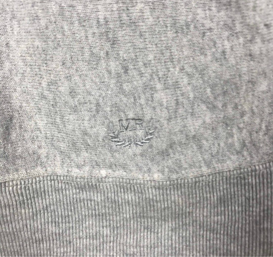Champion sweater store material crossword
