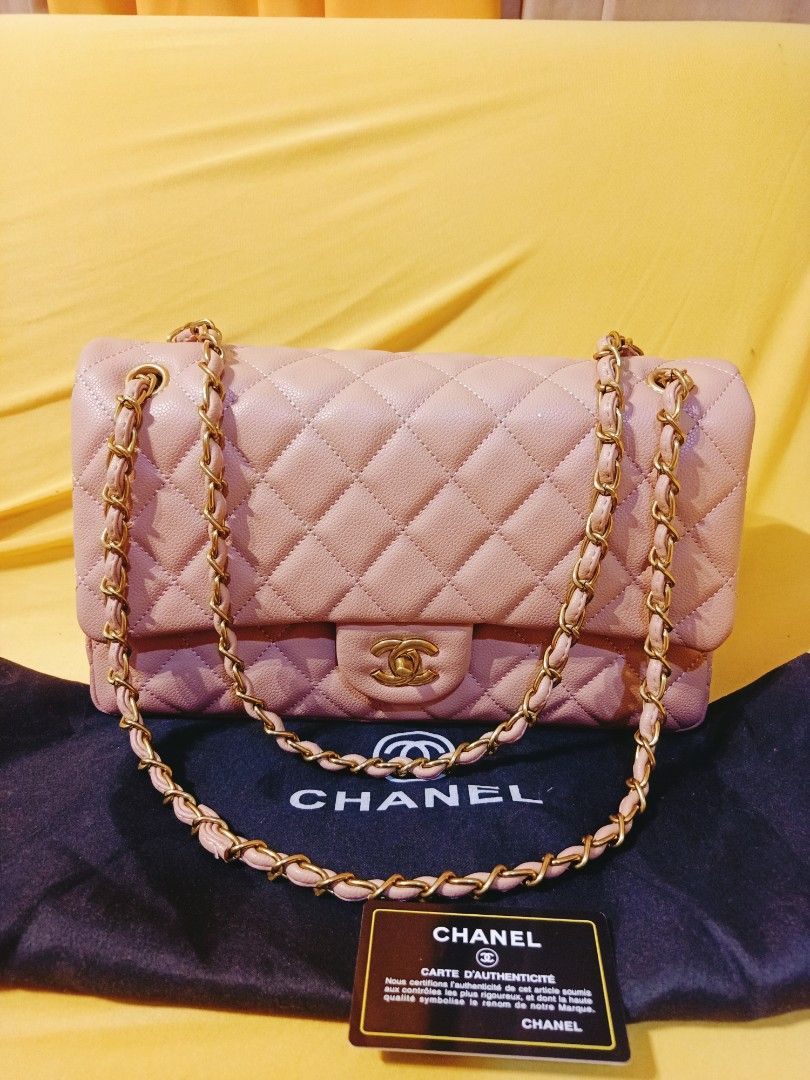 Japan Preloved Chanel Double flap (Category: Luxury Bags & Wallets) located in Cebu City. Submitted by day.98 (Listing ID 1245184055, Image 2). Description: selected from japan surplus genuine leather caviar leather with holo sticker & dust bag nude pink 35cm no flaws.