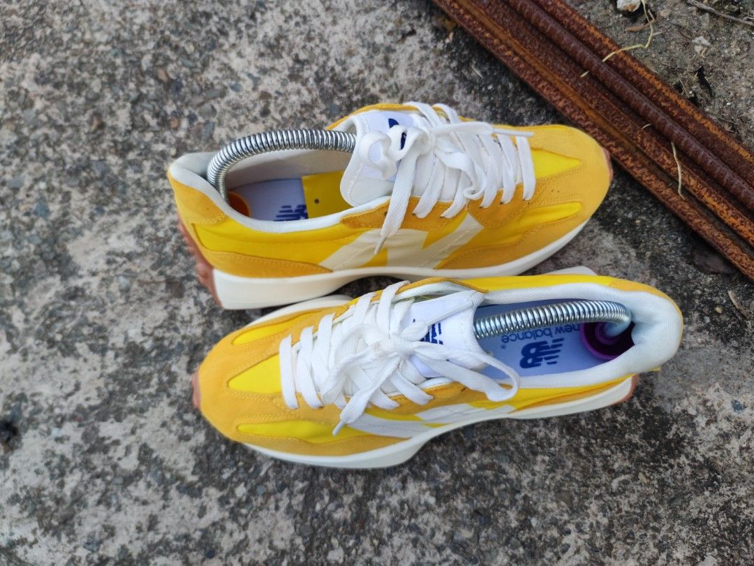 Yellow and white trainers best sale