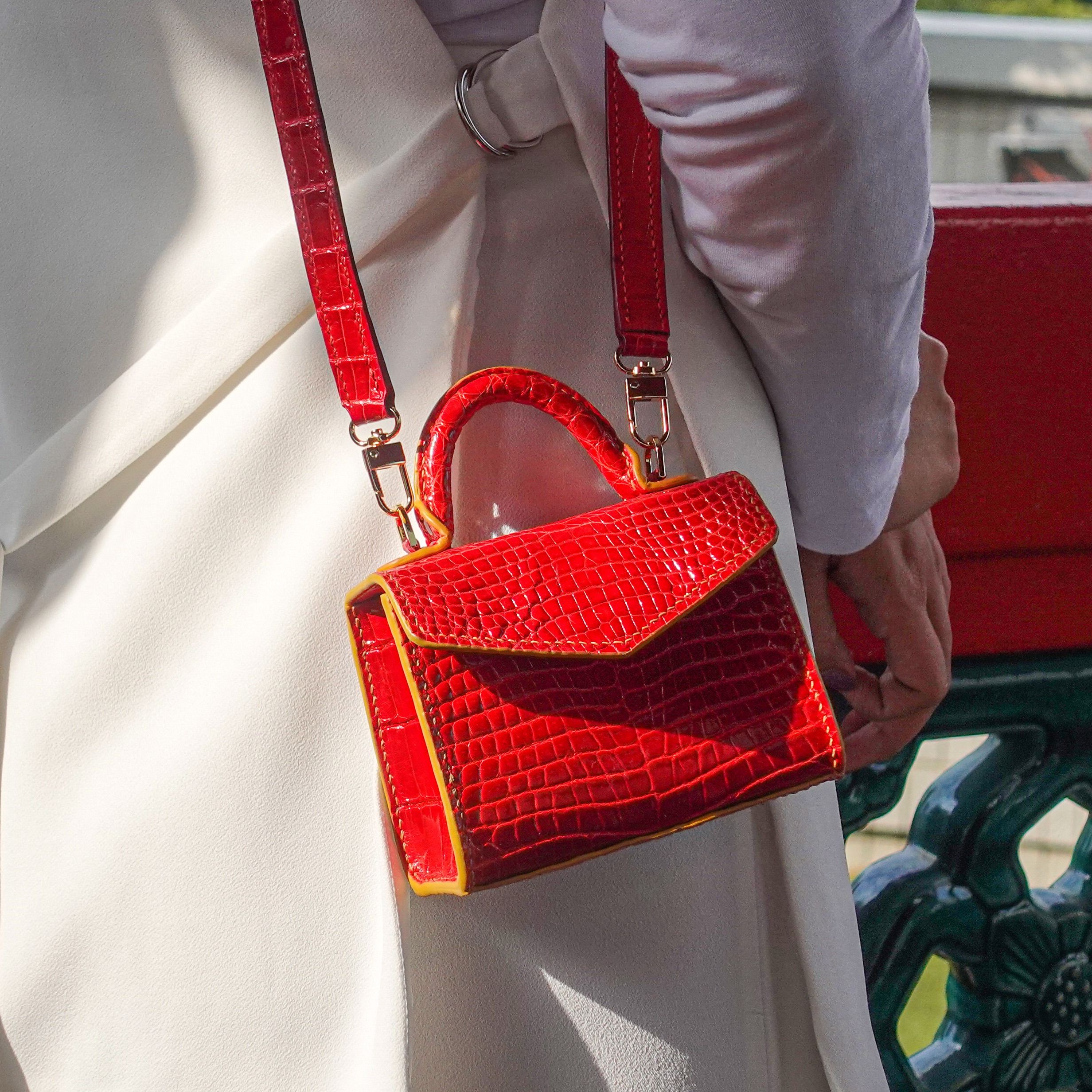 Red genuine leather handbag store