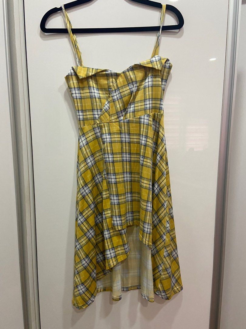 Yellow plaid summer dress (Category: Dresses) located in Cebu City. Submitted by tingaling0 (Listing ID 1245107788, Image 1). Description: •Stretchy and light fabric •Great as a beach cover up •Fits small to medium RFS: Decluttering.