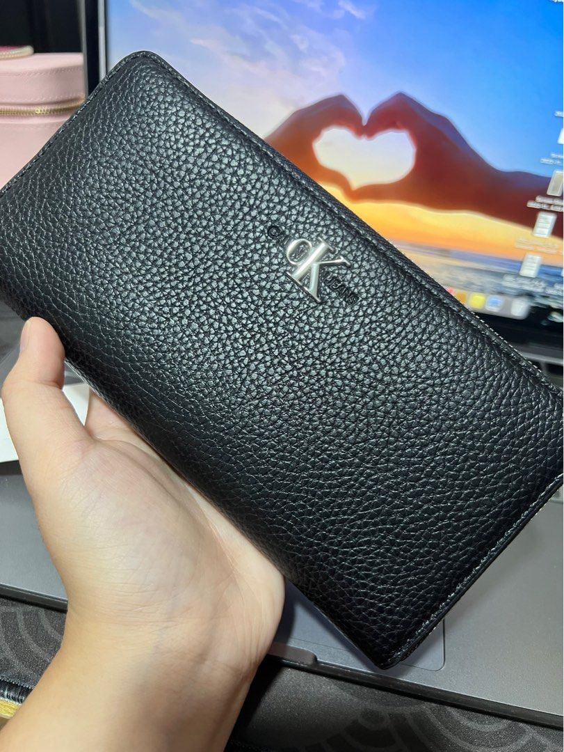 BRAND NEW CALVIN KLEIN LONG WALLET (Category: Wallets & Card holders) located in Manila. Submitted by dballison (Listing ID 1245381571, Image 1). Description: BRAND NEW CALVIN KLEIN LONG WALLET - Brand new and Original - with tags - Bought from AU - Pebbled Leather (soft) - Super nice in actual - no box and plastic .