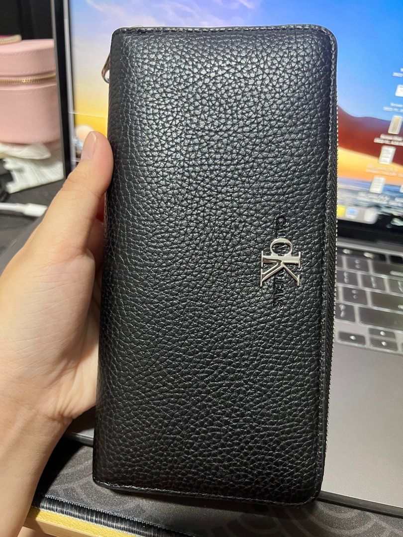 BRAND NEW CALVIN KLEIN LONG WALLET (Category: Wallets & Card holders) located in Manila. Submitted by dballison (Listing ID 1245381571, Image 2). Description: BRAND NEW CALVIN KLEIN LONG WALLET - Brand new and Original - with tags - Bought from AU - Pebbled Leather (soft) - Super nice in actual - no box and plastic .