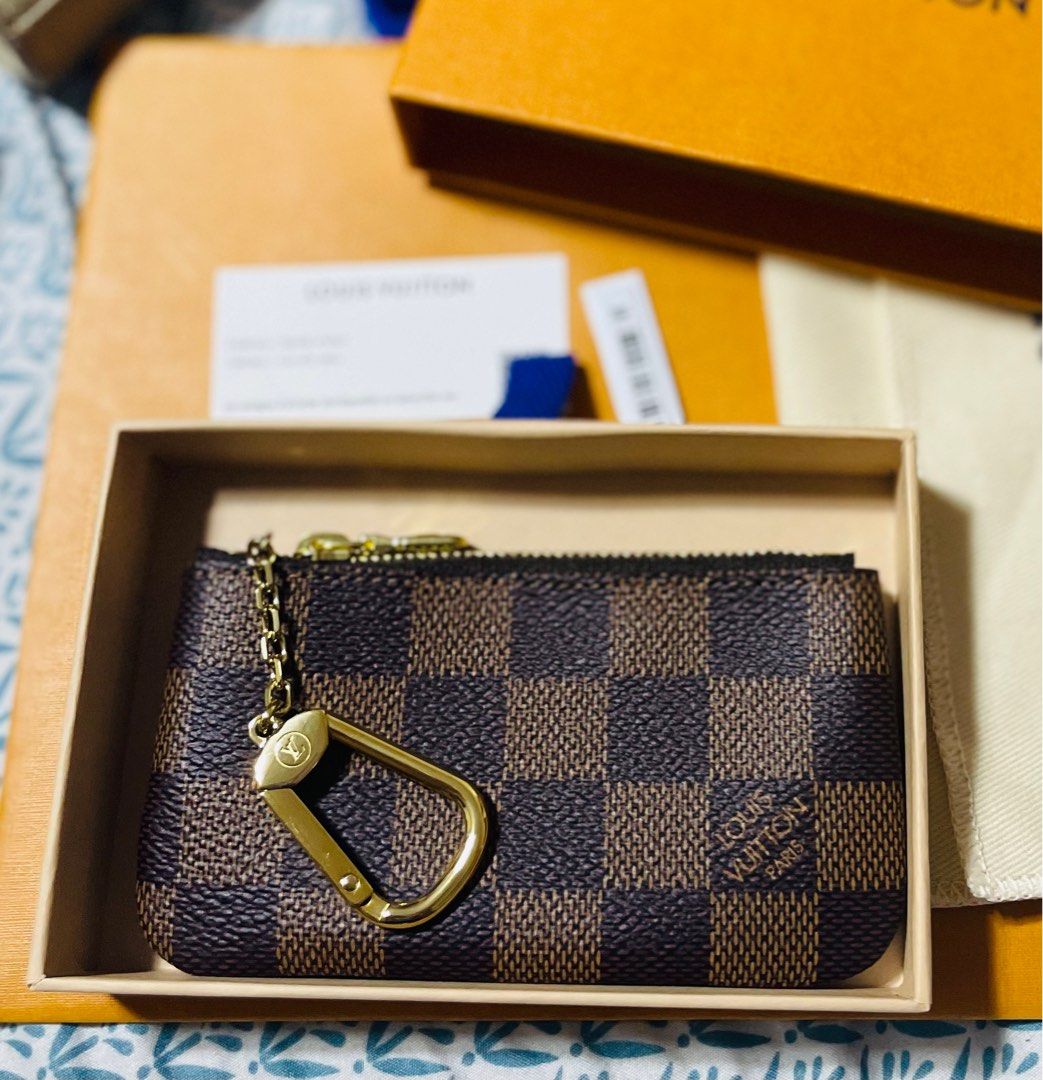 RESERVED] Louis Vuitton Key Pouch Monogram Canvas, Luxury, Bags & Wallets  on Carousell