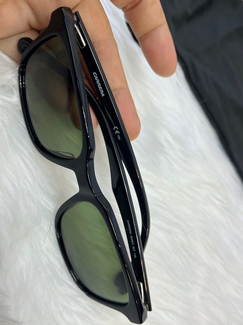 CARRERA Demo Rectangular Sunglasses (Category: Sunglasses & Eyewear) located in Taguig. Submitted by mhalet.902 (Listing ID 1245304944, Image 3). Description: Gender: Unisex Model: 5546/V Bridge Size: 18mm Temple Length: 100mm Length of Drop: 45mm Lens Type / Color: Full Shade/Green Frame Material: Acetate Lens Measurement: 52mm W x 38mm H Inclusion: Original case and original dust bag Detailed Item Description: This item has been used but no maj
