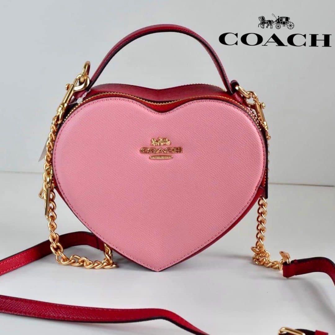 Coach Pink Heart Shape Body Bag (Category: Luxury Bags & Wallets) located in Taguig. Submitted by prettyandpaired (Listing ID 1245371707, Image 1). Description: Actual photos posted.