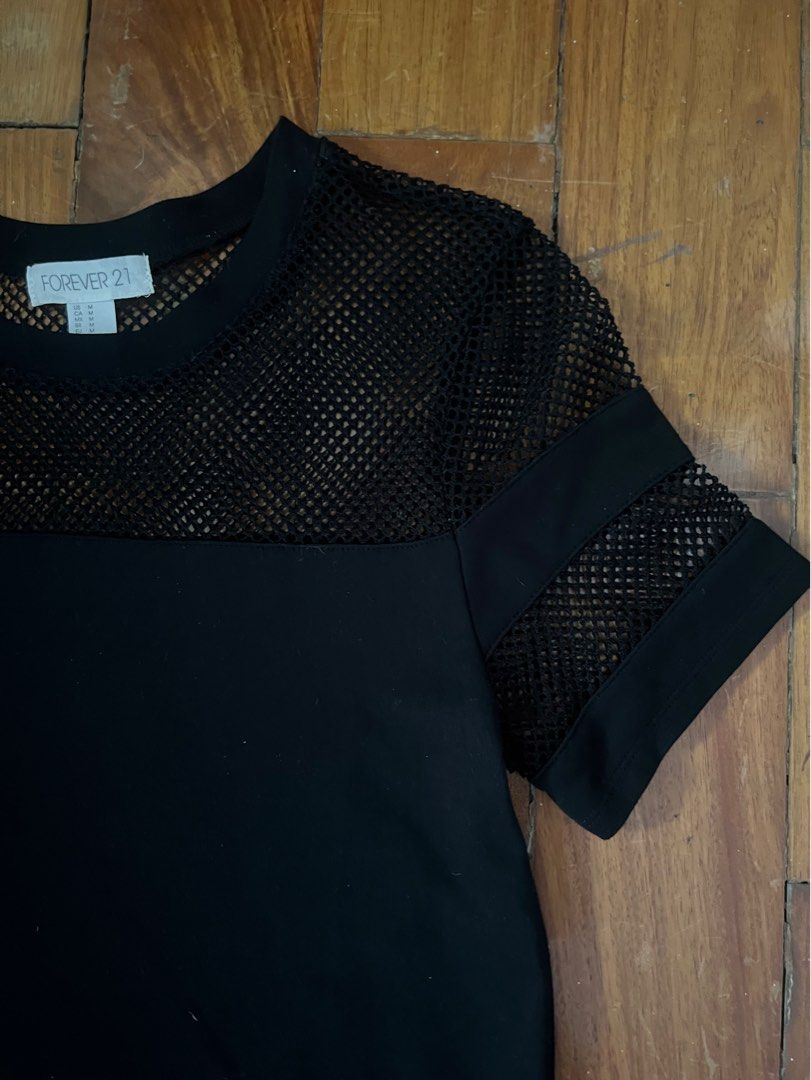 Forever 21 Black Mesh Bodycon Dress (Category: Dresses) located in Paranaque City. Submitted by chicnuggies (Listing ID 1245262799, Image 2). Description: ends about mid to lower thigh for me. body hugging. may fit up to size l to xl.