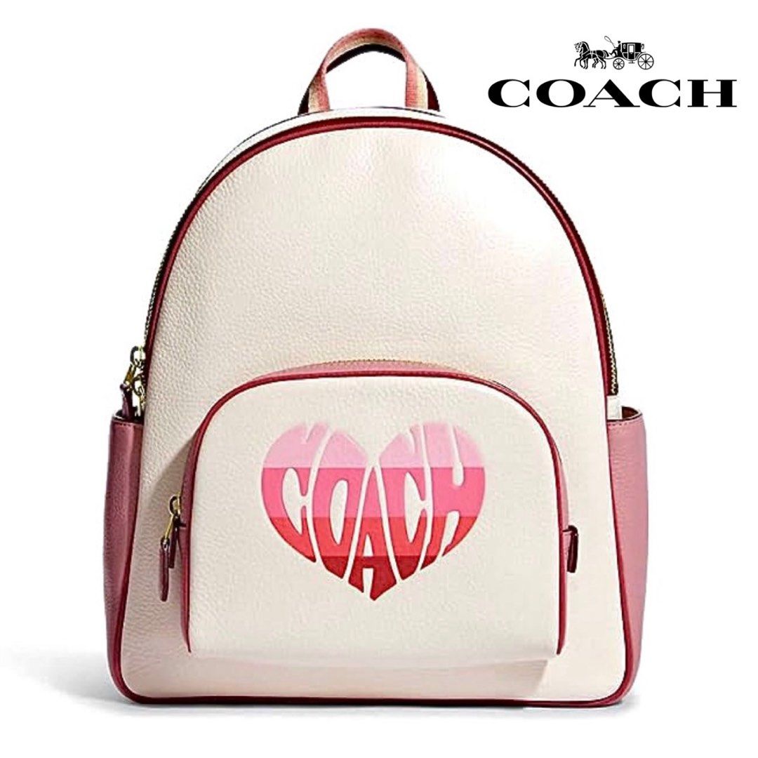 coach heart backpack Crossbody 14 with Pillow Quilting Club de Mode Printed coated canvas and refined pebble leather Inside zip and multifunction pockets Double zip closure fabric lining Handle with 2 1/4 drop Outside zip pocket Adjustable shoulder straps 10 3/4 (L) x 12 1/2 (H) x 4 3/4 (W) Style No. COACH Quilted Leather Pillow Heart