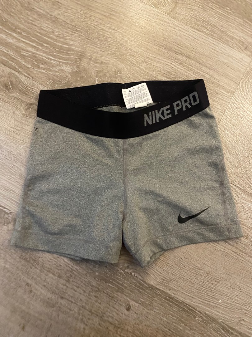 yellow and green nike shirt