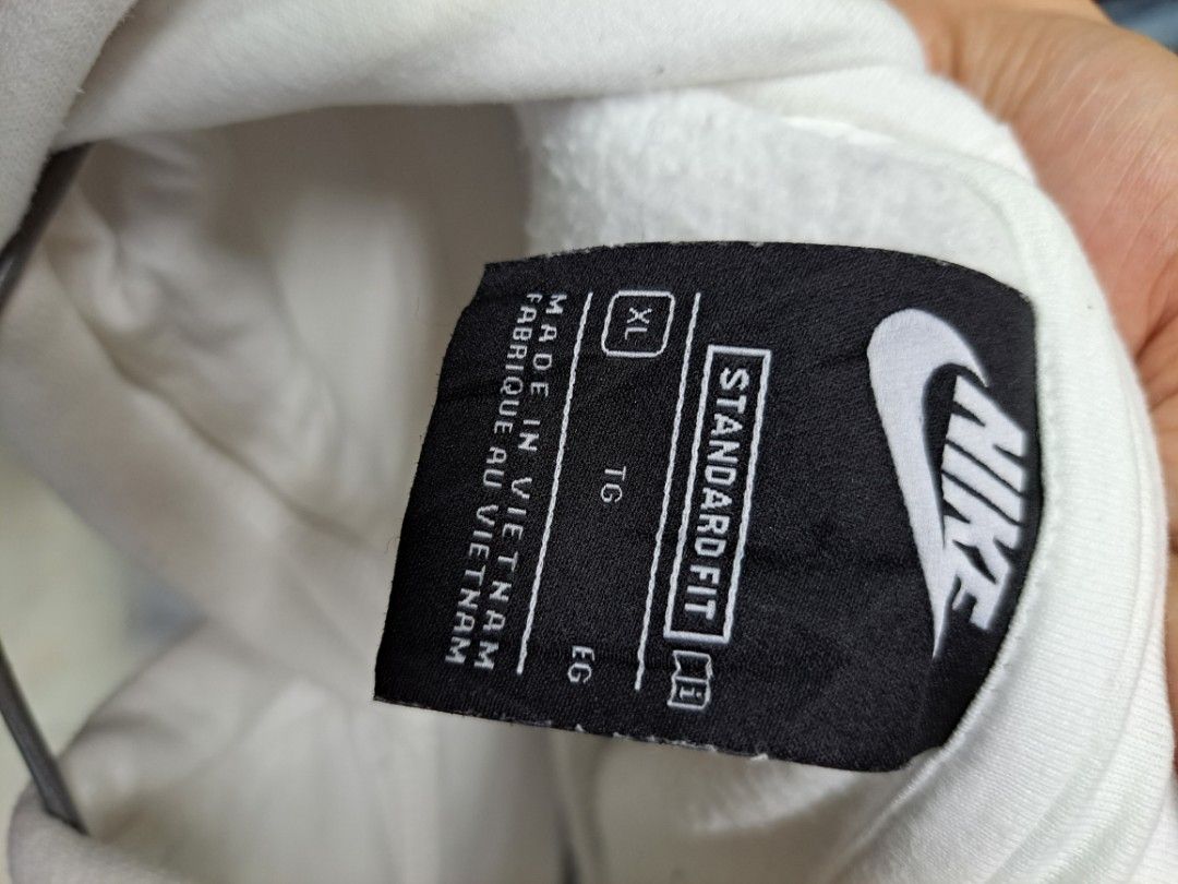 white nike hoodie with orange logo