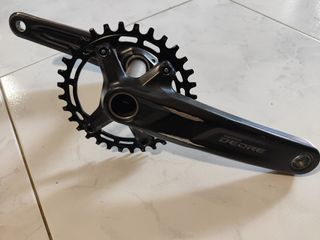 Shimano M5100 crankset with pedals