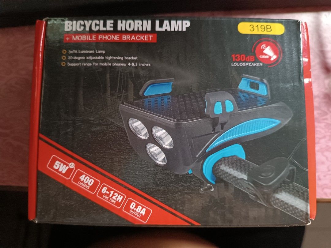 Bicycle head lamp phone holder horn