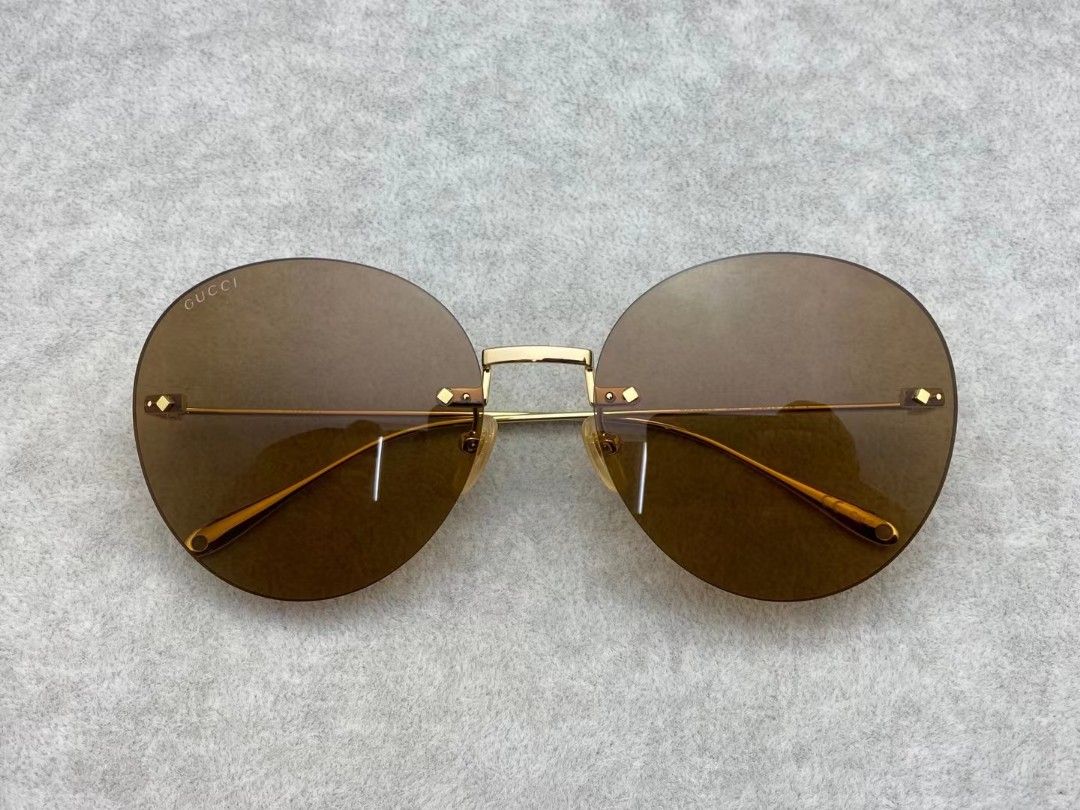 Gucci round outlet rimless sunglasses