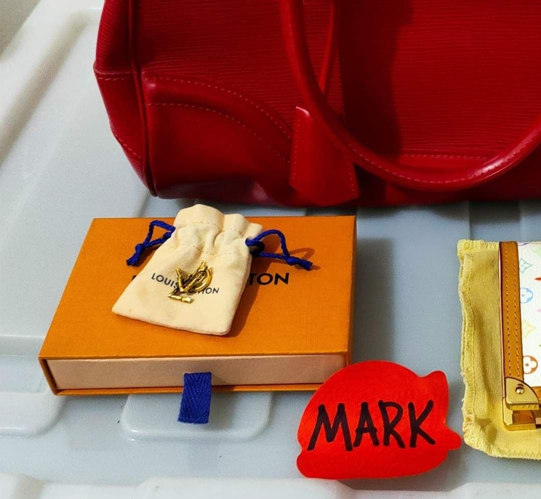 Louis Vuitton earrings / pendant (Category: Luxury Accessories) located in Cebu City. Submitted by xoxoxo888marco (Listing ID 1245470945, Image 1). Description: one piece earrings convertible into earrings & pendant..