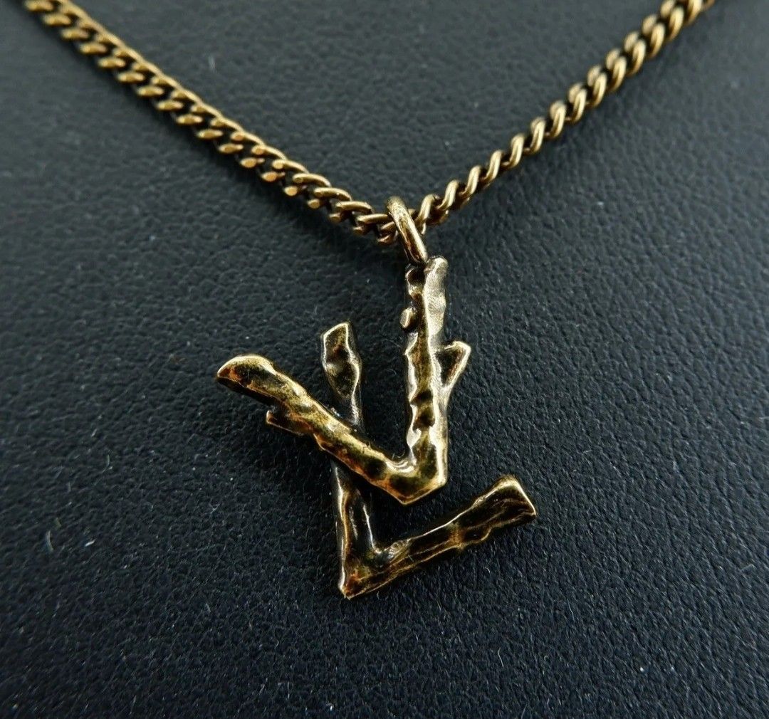 Louis Vuitton earrings / pendant (Category: Luxury Accessories) located in Cebu City. Submitted by xoxoxo888marco (Listing ID 1245470945, Image 2). Description: one piece earrings convertible into earrings & pendant..