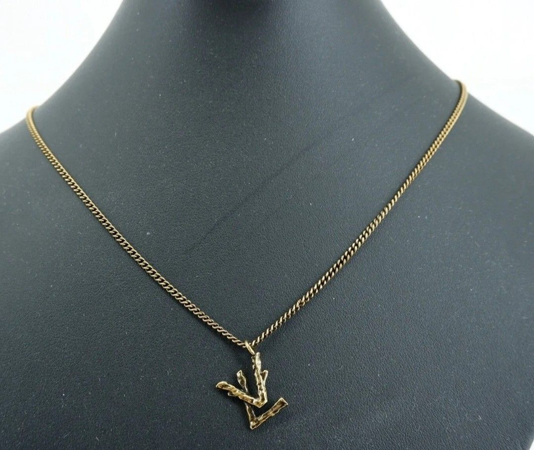 Louis Vuitton earrings / pendant (Category: Luxury Accessories) located in Cebu City. Submitted by xoxoxo888marco (Listing ID 1245470945, Image 3). Description: one piece earrings convertible into earrings & pendant..