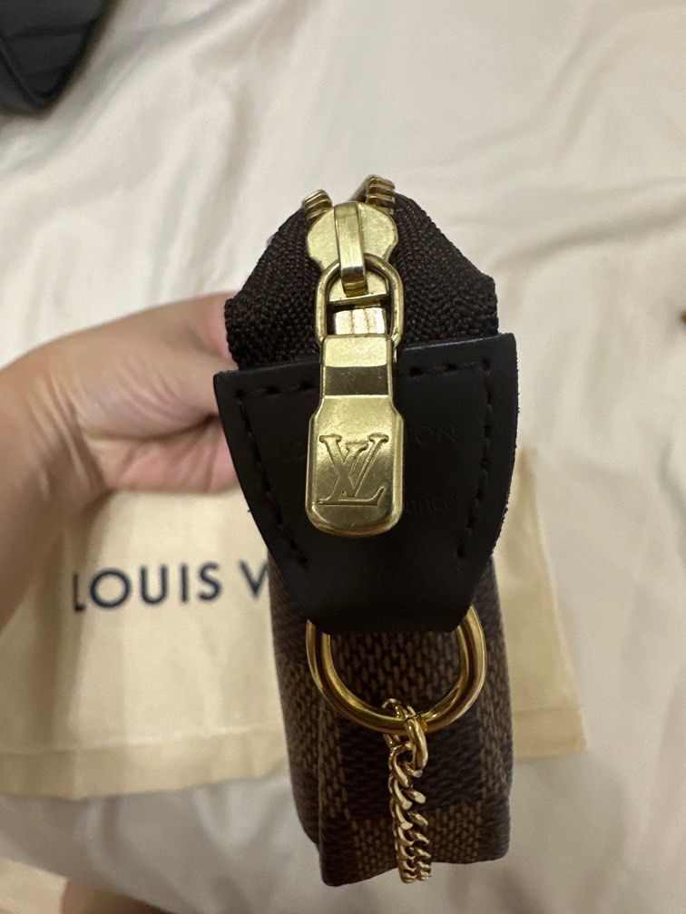 LV mini pochette (Category: Luxury Bags & Wallets) located in Batangas. Submitted by luxuryinmyclowset (Listing ID 1245537644, Image 2). Description: Mini pochette in damier ebene Complete inclusions with box, paper bag, cards .