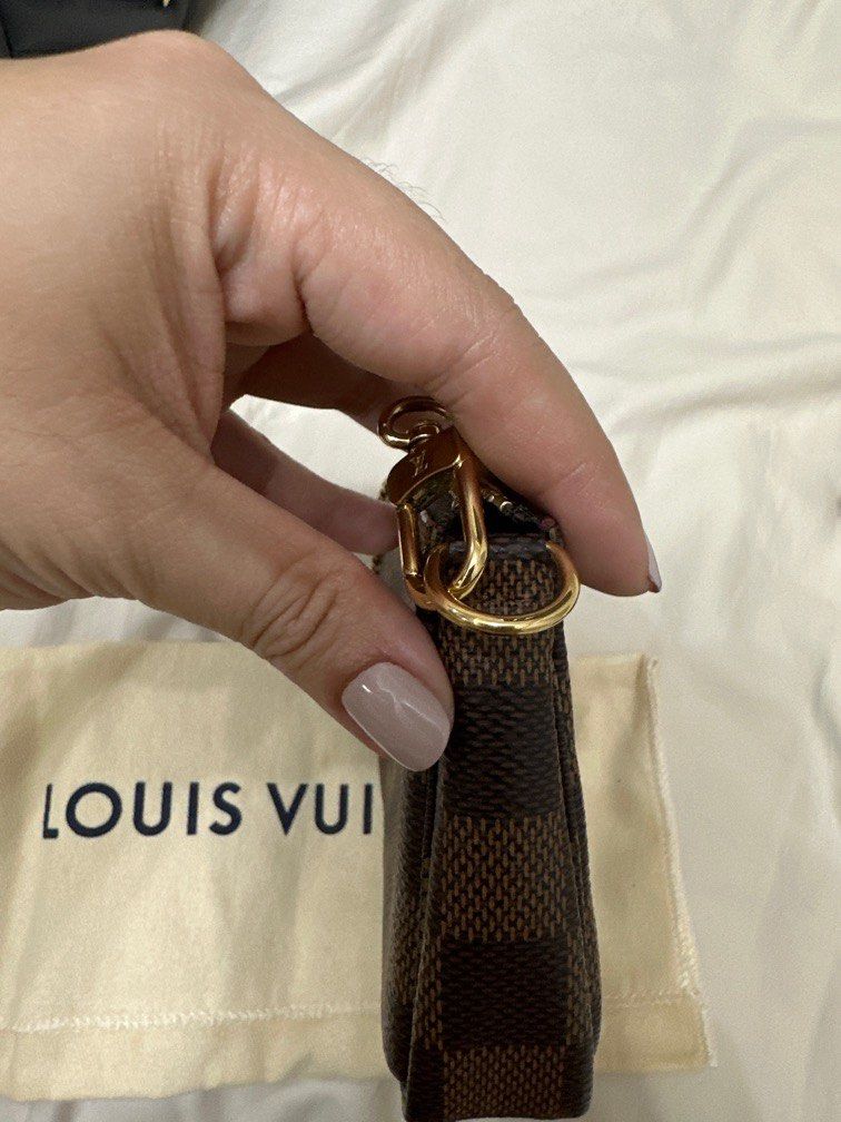 LV mini pochette (Category: Luxury Bags & Wallets) located in Batangas. Submitted by luxuryinmyclowset (Listing ID 1245537644, Image 3). Description: Mini pochette in damier ebene Complete inclusions with box, paper bag, cards .
