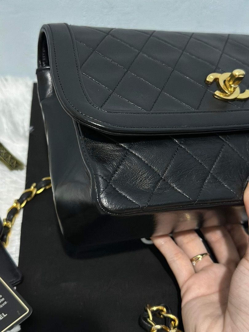 Vintage Chanel Diana Small with wallet (Category: Luxury Bags & Wallets) located in Quezon City. Submitted by hellopatchi (Listing ID 1245444096, Image 2). Description: Chanel Vintage Diana Small with wallet Holo intact with guarantee card and dustbag Wrinkles sa lower part leather ng bag lang pinaka sign of use due to age na din since vintage hindi dry ang lambskin In very good condition pa sya for a vintage piece Hardware 8.8/10 gold hindi lang