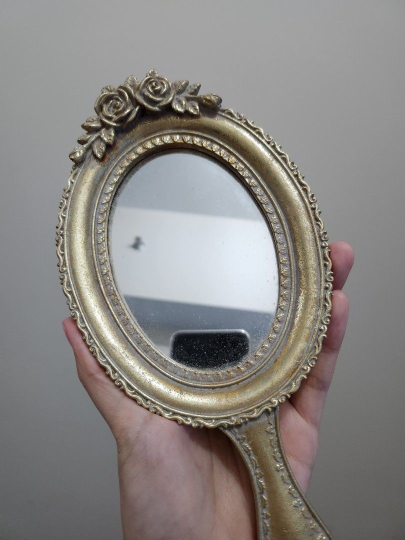 Vintagestyle handheld mirror on Carousell
