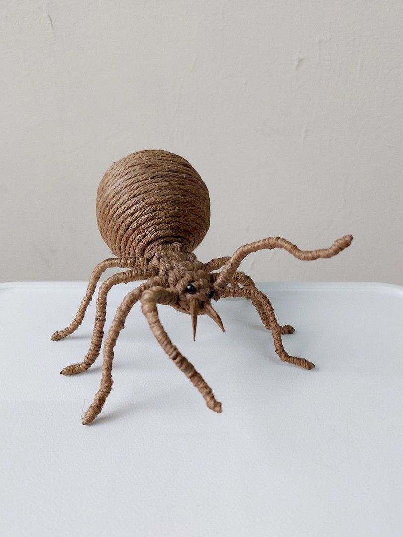 Woven Spider (Category: Figurines & Statues) located in Manila. Submitted by igetrinidad (Listing ID 1245570837, Image 1). Description: Woven Poseable Tabletop spider Original Price: Php 700 Condition & Item Details: •poseable legs made of wire inside • bought at sm aura, bgc RFS (reason for selling): Decluttering Delivery & Payment: •GCash + Shipping Fee c/o buyer •No deliveries outside Metro Manila •Payment confirmation first before I send the 