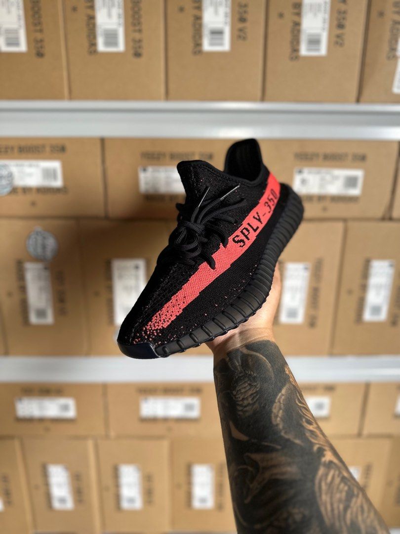 Yeezy red stripe hot sale