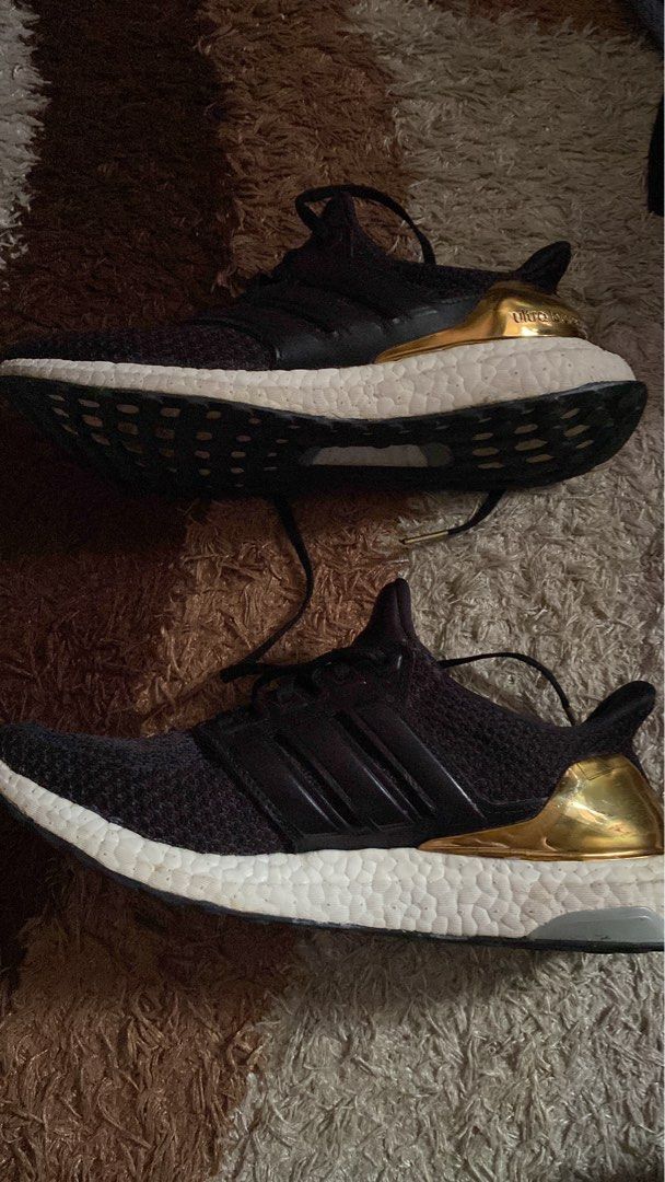 Ultra boost gold hotsell medal on feet