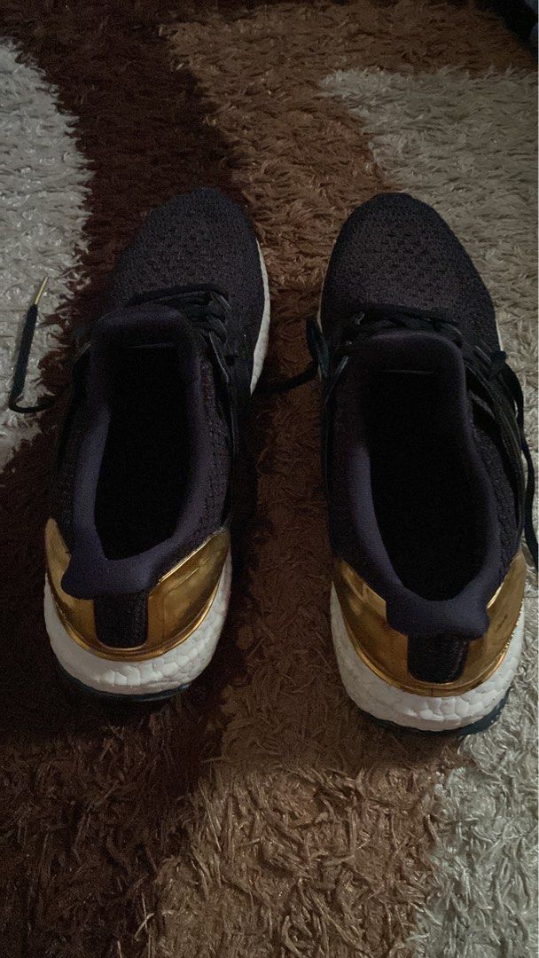 Ultra boost gold on sale medal on feet