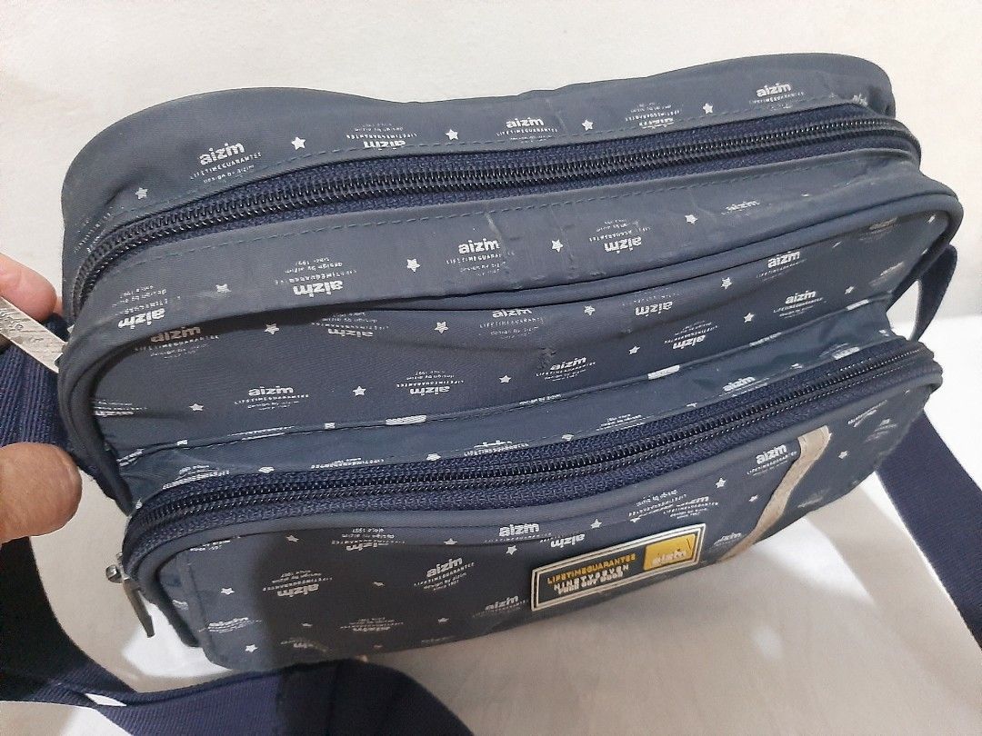 AIZIM MENS SLING BAG (Category: Sling Bags) located in Las Pinas. Submitted by dnbshphb (Listing ID 1245665488, Image 3). Description: Original Aizim Mens Sling Bag Water resistant Malinis Preloved expect sign of usage pls.see all photos.