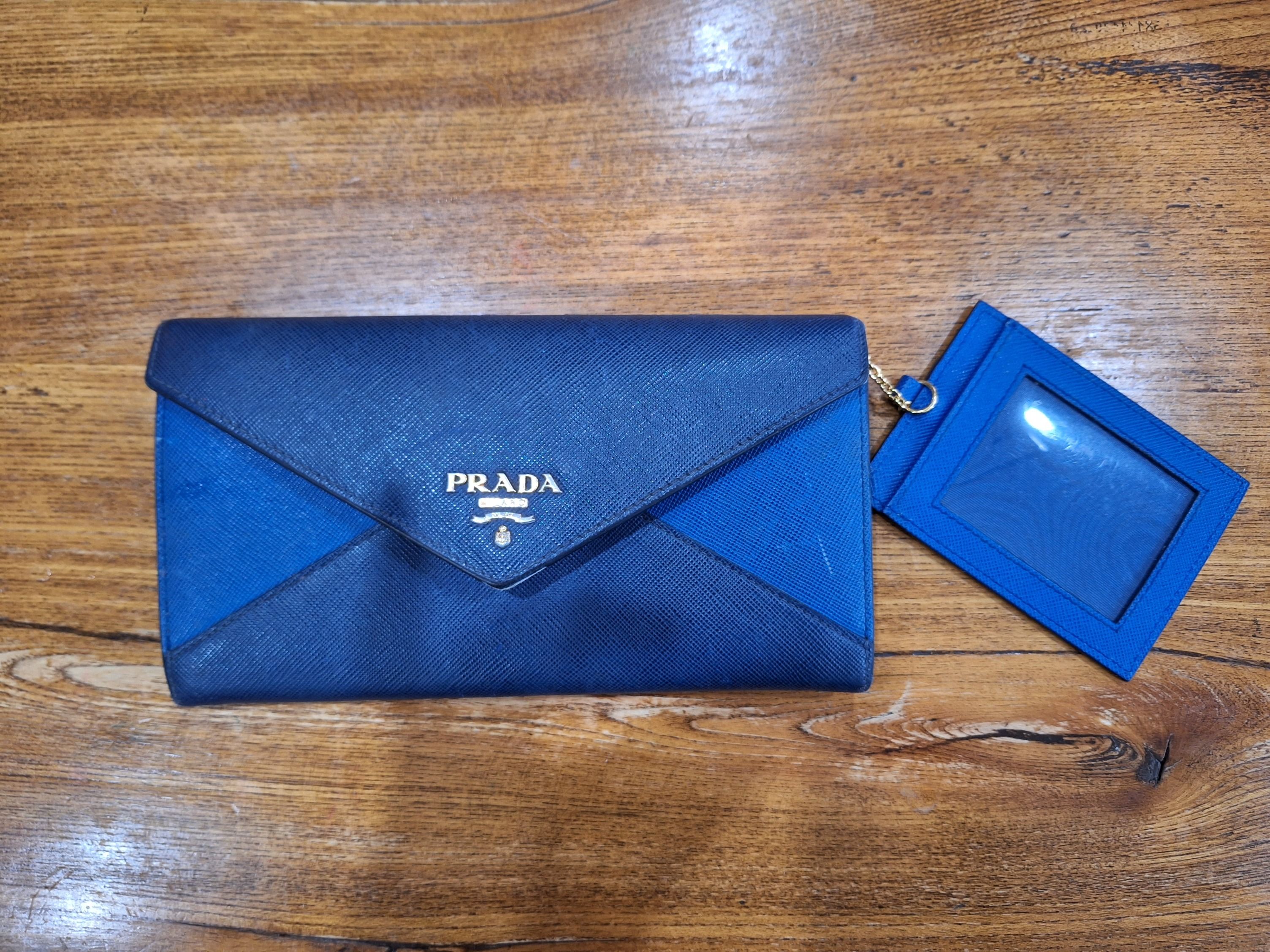 Prada wallet on chain in blue. 100% authentic. Came with original dusk bag  and receipt., Luxury, Bags & Wallets on Carousell