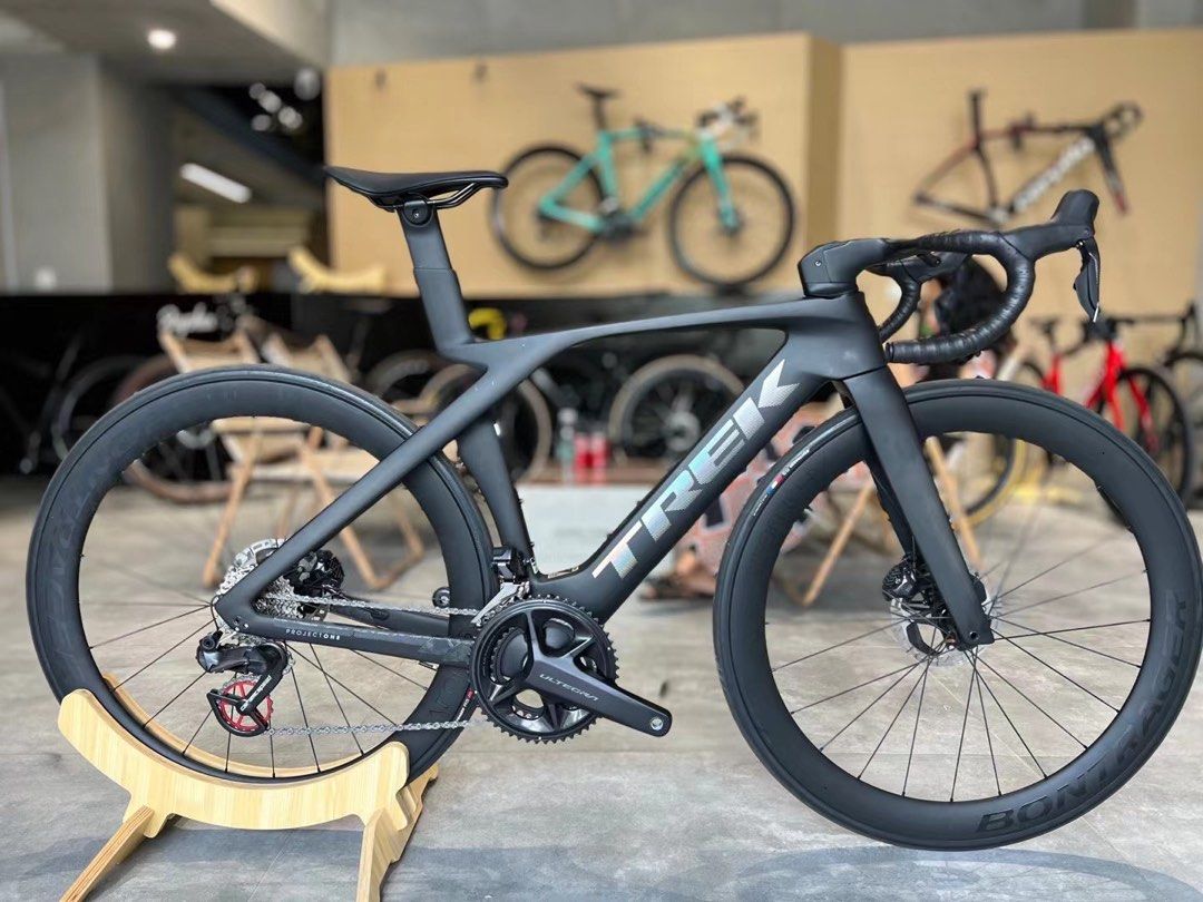 trek madone vs pinarello f12