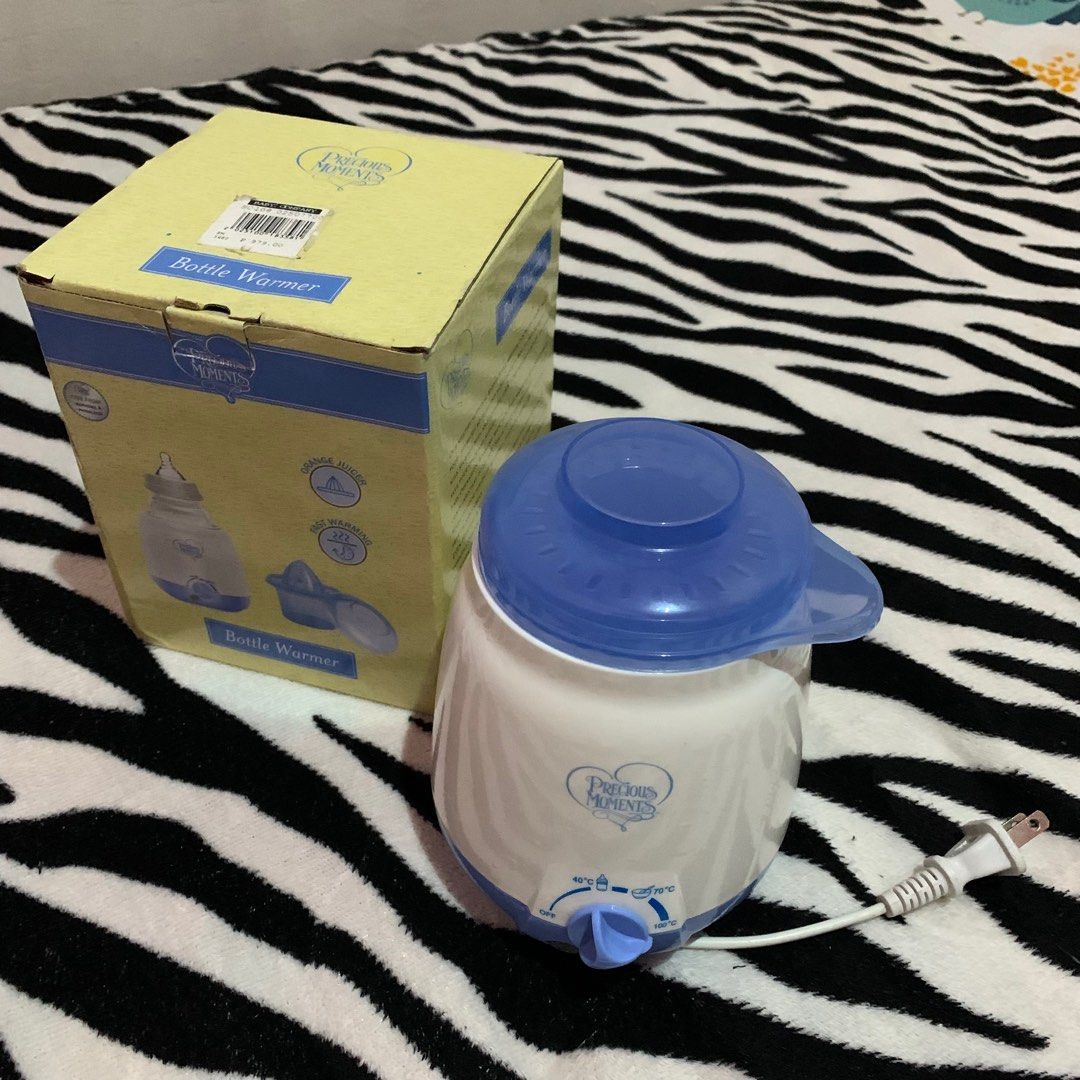 Bottle warmer (Category: Weaning & Toddler Feeding) located in Iloilo. Submitted by declutterbykid (Listing ID 1245674691, Image 1). Description: Precious Moments Bottle Warmer Perfect po for mommas na nagstash ng breast milk Used for a month lang ₱500.00 fixed price.