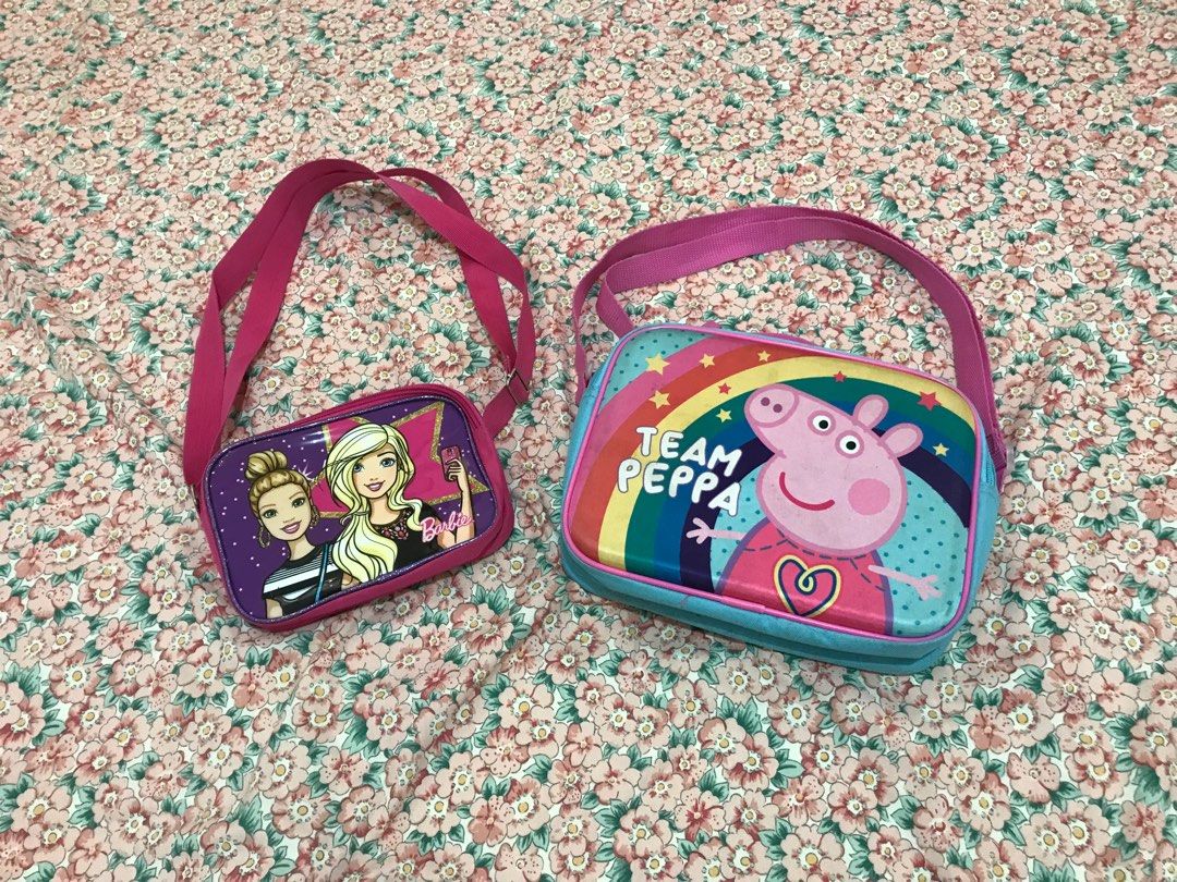 BUNDLE BAG FOR KIDS (Category: Cross-body Bags) located in Santa Rosa. Submitted by _joannealexis (Listing ID 1245717406, Image 1). Description: BARBIE SLING BAG PEPPA PIG LUNCH BAG TAKE ALL ₱500 ‼️ LAST PRICE NA PO 🥹 Barbie bag no issue. Peppa pig lunch bag issue, madumi lang signs of usage and nakatambak na. No shopee checkout ✖️ Courier: JNT 🚚 Lalamove 🚚 📍 STA ROSA LAGUNA.