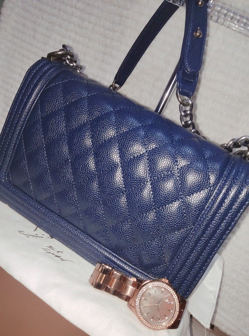 Chanel boy (Category: Luxury Bags & Wallets) located in Quezon City. Submitted by geebags (Listing ID 1245714230, Image 2). Description: for decluttering ! ❤️CHANEL OLD MEDIUM NAVY QUILTED CAVIAR BOY BAG.❤️ ✅CHANEL BOY ✅It comes with orig dust bag only . ✅no issue, Brand new condition ✅orig caviar leather ✅with microchip , serial # code inside ✅ stand alone , good hardware ✅beautiful craftmanship. ✅ FLAWLESS body in & out ✅ flawless chain no fade