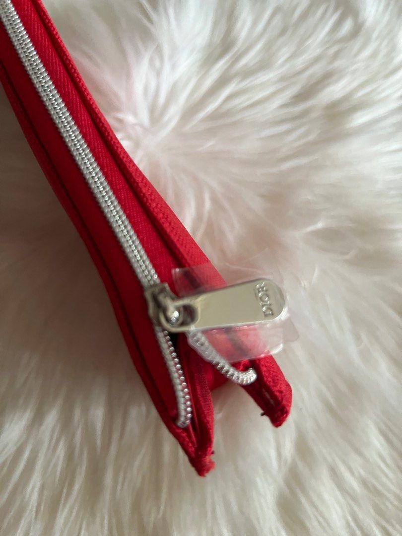 CHRISTIAN DIOR RED TROUSSE POUCH (Category: Makeup) located in Makati City. Submitted by cashfrancefashioncosmetics_ph (Listing ID 1245636816, Image 3). Description: NO BOX COLOR:Red SIZE:is Posted Original Leather Inside .