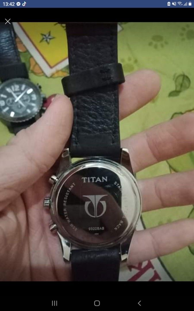Titan 9322sab hotsell