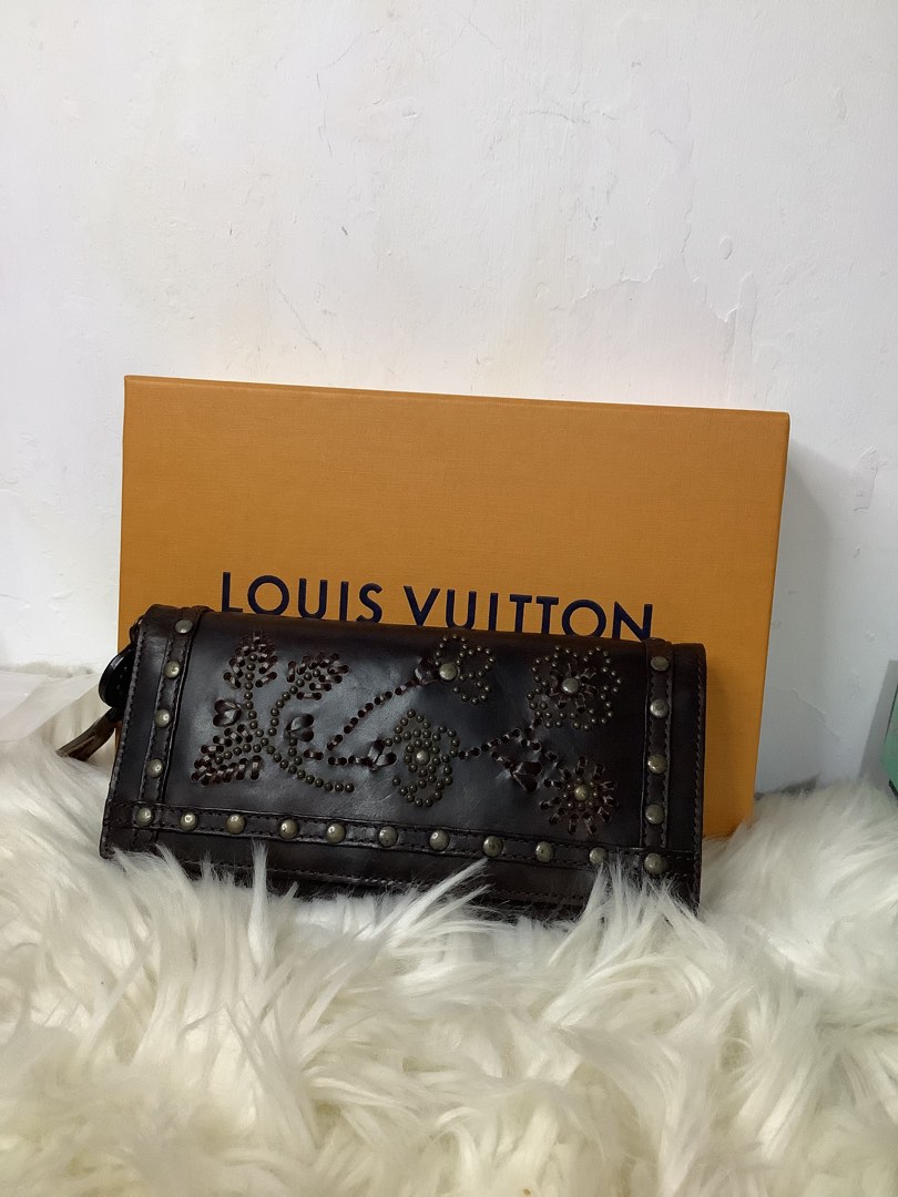 Kenzo Long wallet on Carousell