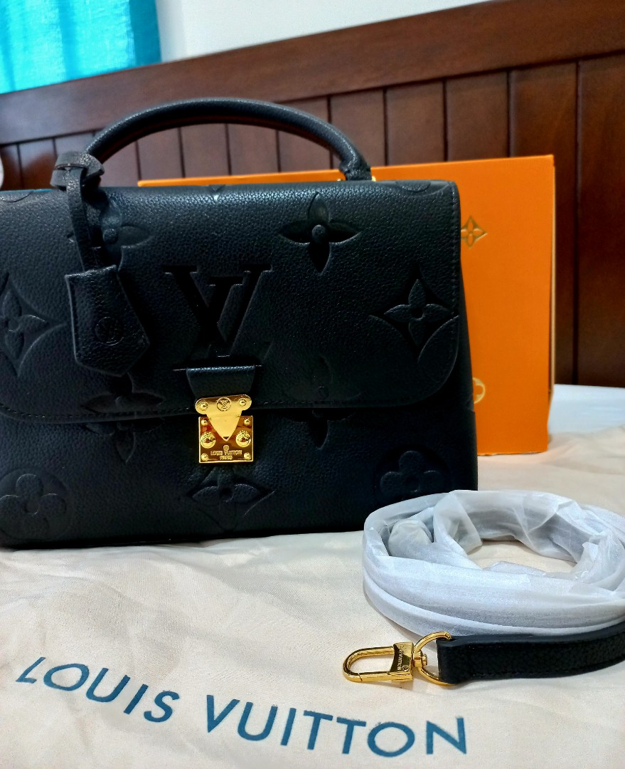 Louis Vuitton - Authenticated Madeleine Handbag - Leather Black for Women, Good Condition
