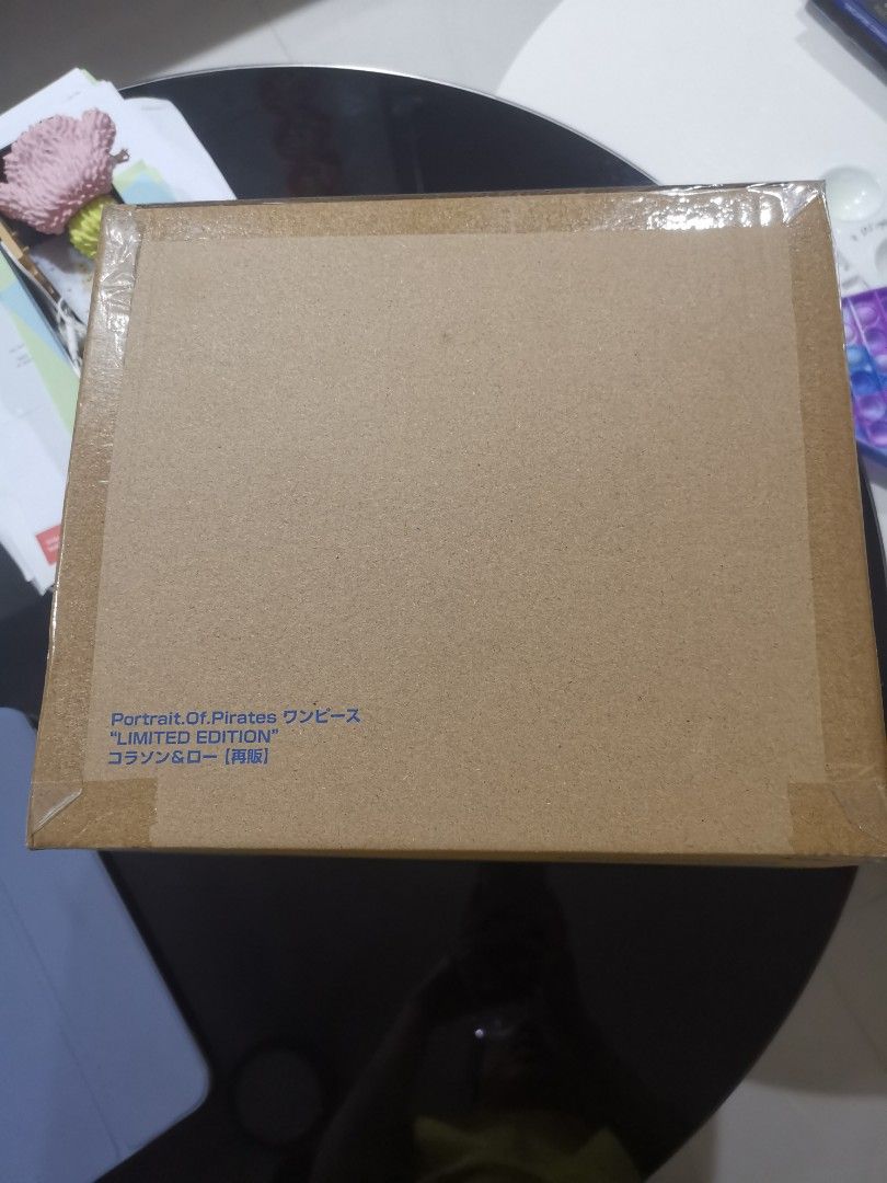 One piece portrait of pirates law and corazon/rosinante donquixote one piece figure figurine (Category: Toy Figures) located in Singapore. Submitted by ambulons_conjunx (Listing ID 1245737428, Image 2). Description: Brown box still unopened.