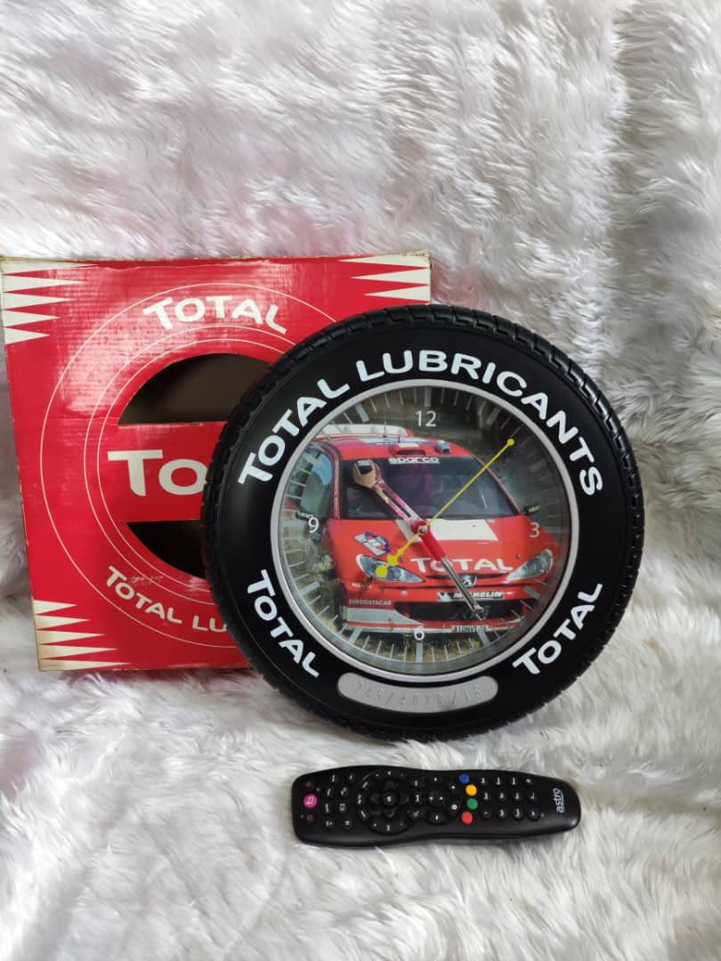 Total Lubricant Wall Clock, Furniture & Home Living, Home Decor, Clocks on Carousell