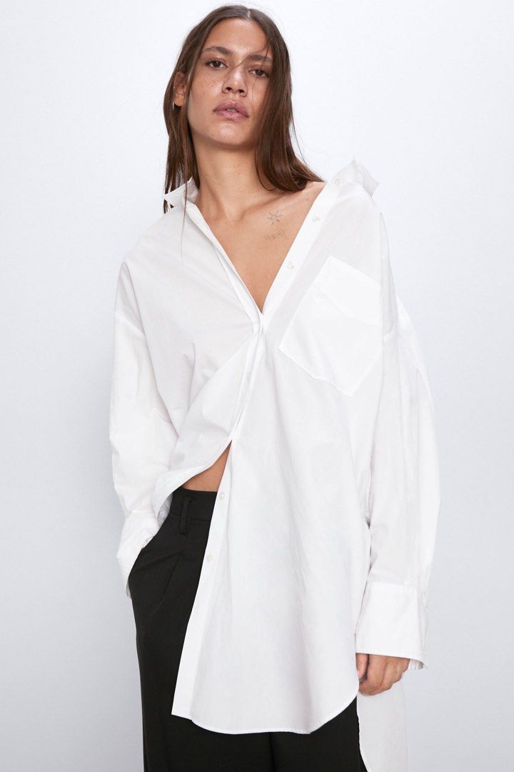 Zara Oversized Poplin Shirt (Category: Shirts) located in Quezon City. Submitted by tk.as (Listing ID 1245573615, Image 1). Description: Never used just stored in my closet Originally bought for ₱2295 XS on tag but fits size small the best.