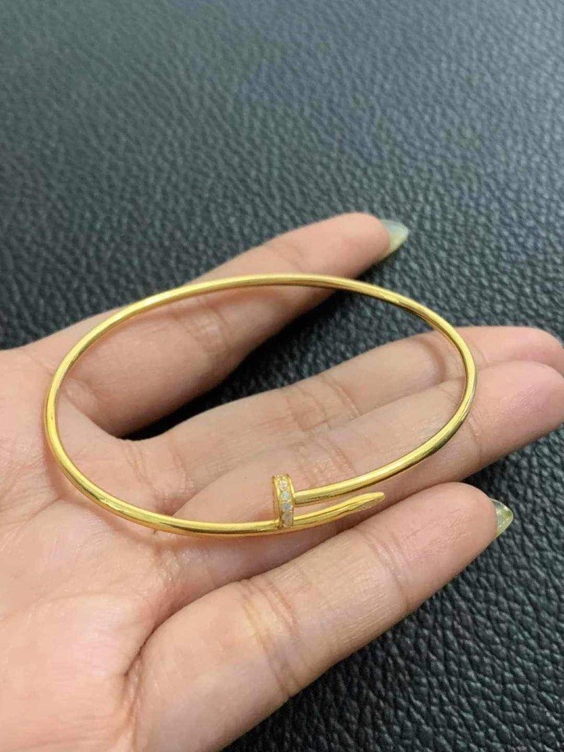 18K Gold Bangle (Category: Bracelets) located in Cainta. Submitted by krissssh (Listing ID 1245863351, Image 1). Description: Cartiyer Nail Bangle 2.89 est grams more or less Small-medium size ✅18K SAUDI GOLD ✅💯PAWNABLE .