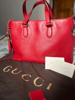 Authentic Gucci leather with gold trimmings