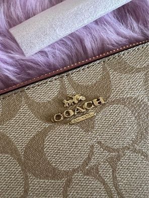 Coach wristlet (Category: Luxury Bags & Wallets) located in Mandaluyong City. Submitted by pheewz07 (Listing ID 1245928113, Image 3). Description: BRAND NEW COACH SIGNATURE WRISTLET PVC LARGE SIZE LIGHT KHAKI - ROSE WITH TAG AND CARECARD NO PAPERBAG PLEASE SEE ACTUAL PHOTOS FOR REFERENCE BOUGHT IN US RFS: decluttering FIXED PRICE - NO HAGGLING.