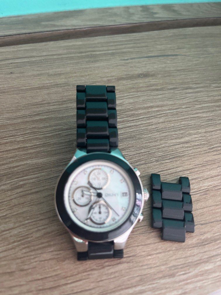 DKNY black ceramic ladies watch, Luxury, Watches on Carousell