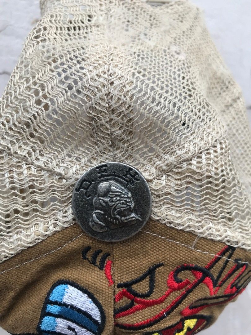 Ed hardy trucker cap (Category: Caps & Hats) located in Quezon City. Submitted by cyborgph (Listing ID 1245894823, Image 3). Description: ed hardy trucker cap in good condition adult size minor scratch on brim minor flaws on net part only (see pictures) negotiable just shoot your offer.